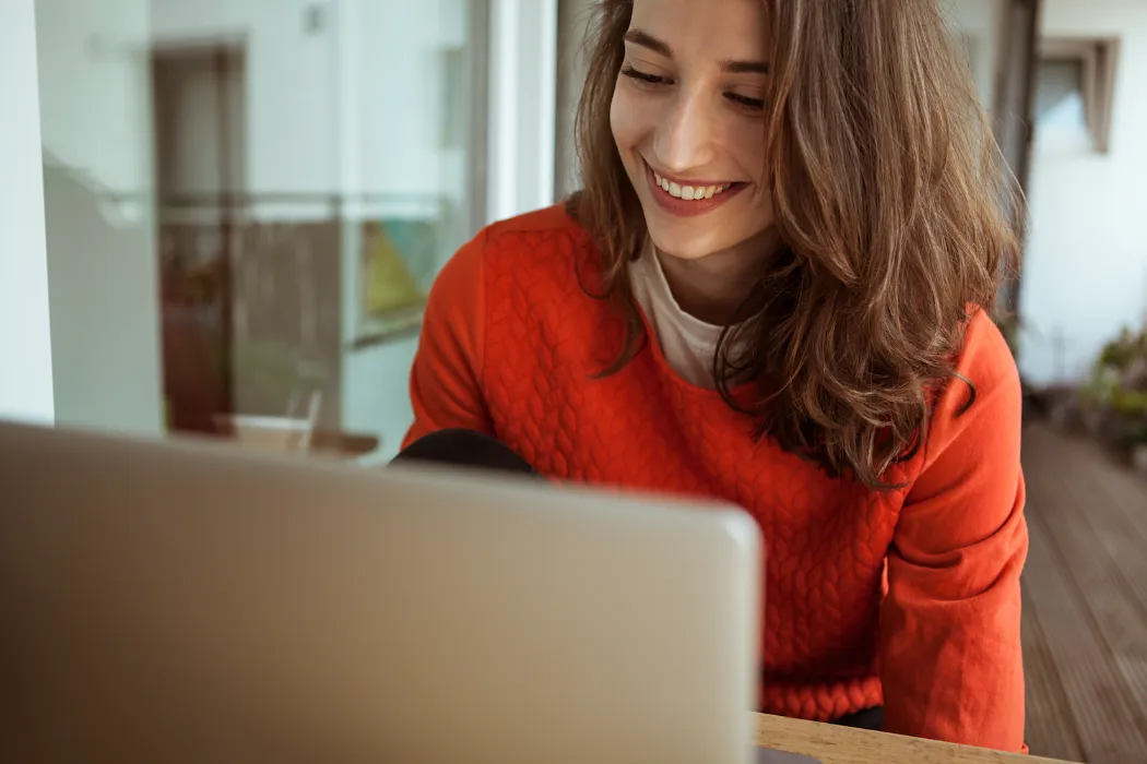 Woman looking at computer.